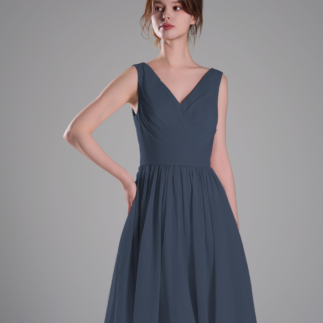 V-Neck Sleeveless Pleated Bodice Flowing Mini Dresses