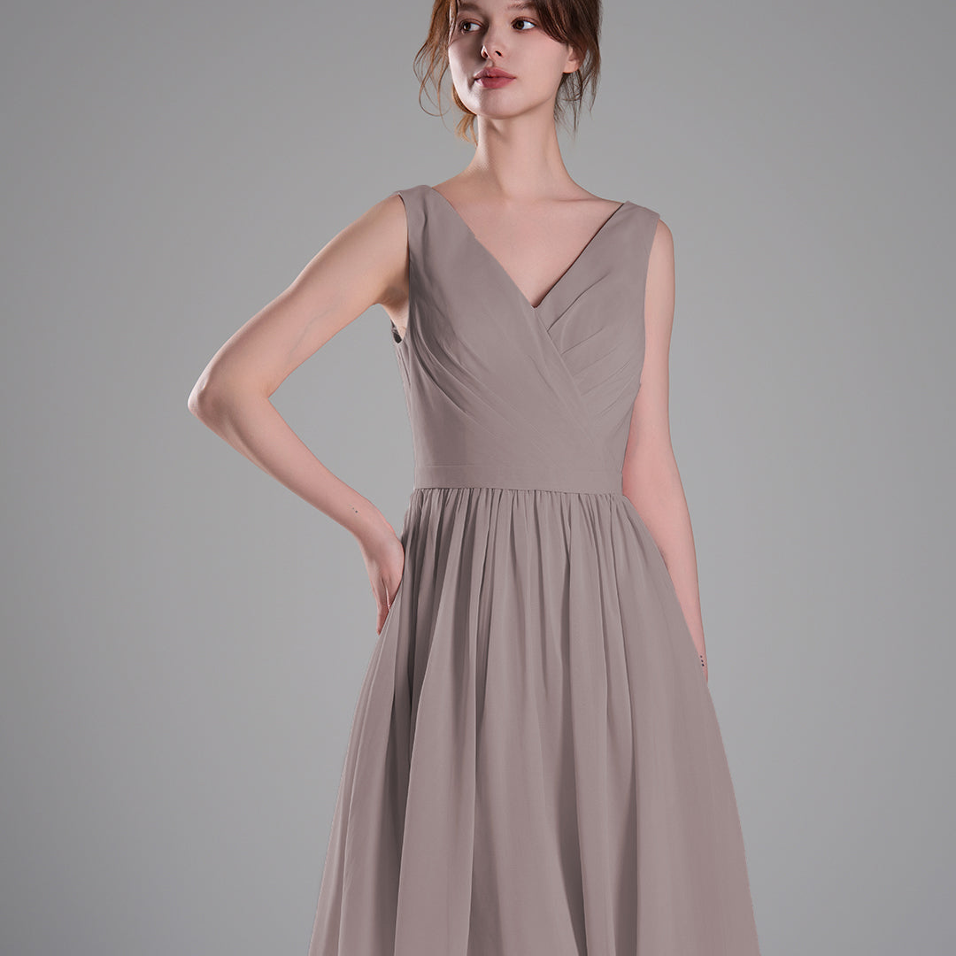 V-Neck Sleeveless Pleated Bodice Flowing Mini Dresses