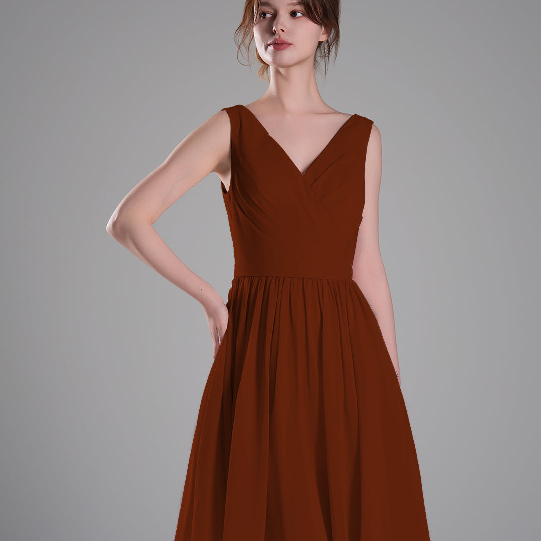 V-Neck Sleeveless Pleated Bodice Flowing Mini Dresses