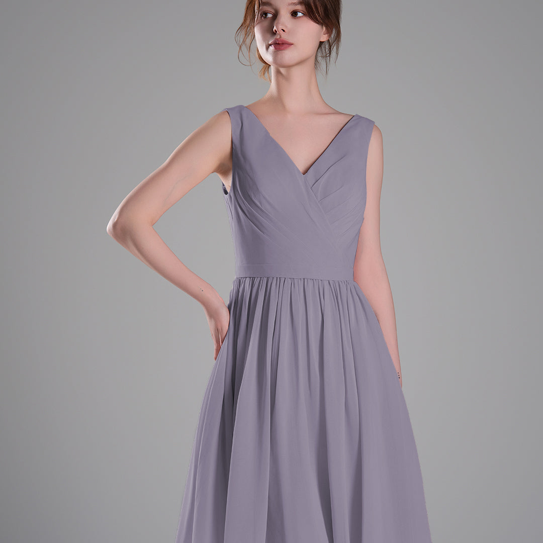 V-Neck Sleeveless Pleated Bodice Flowing Mini Dresses