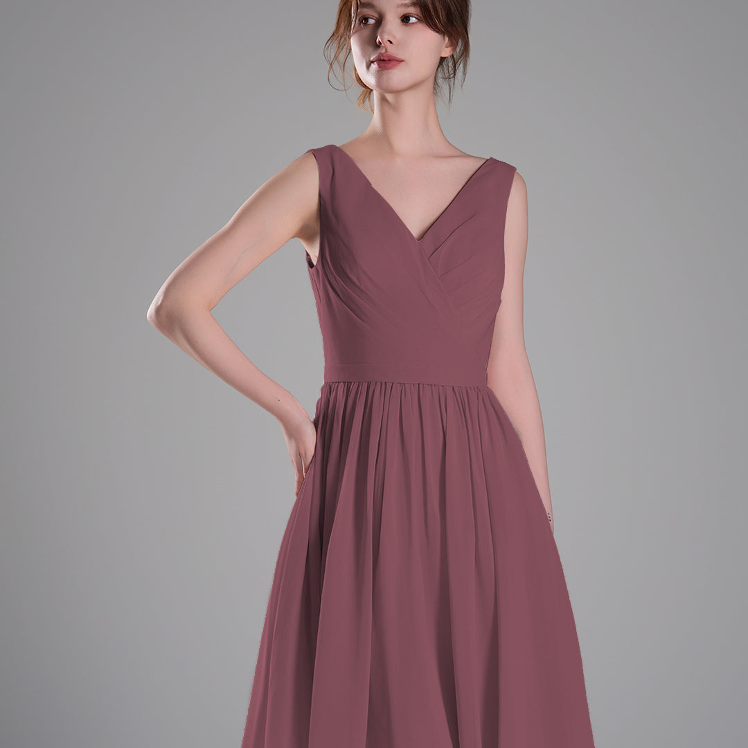 V-Neck Sleeveless Pleated Bodice Flowing Mini Dresses