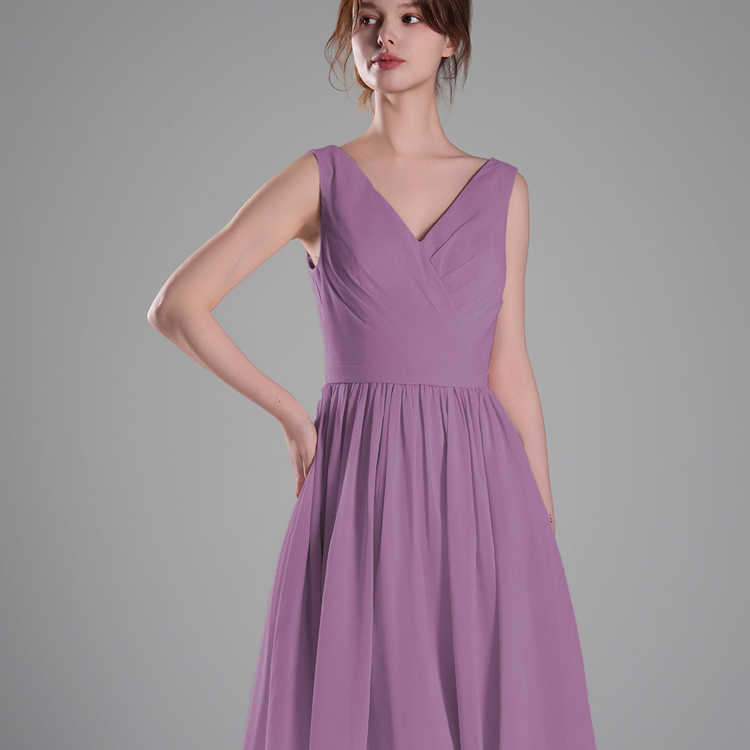 V-Neck Sleeveless Pleated Bodice Flowing Mini Dresses