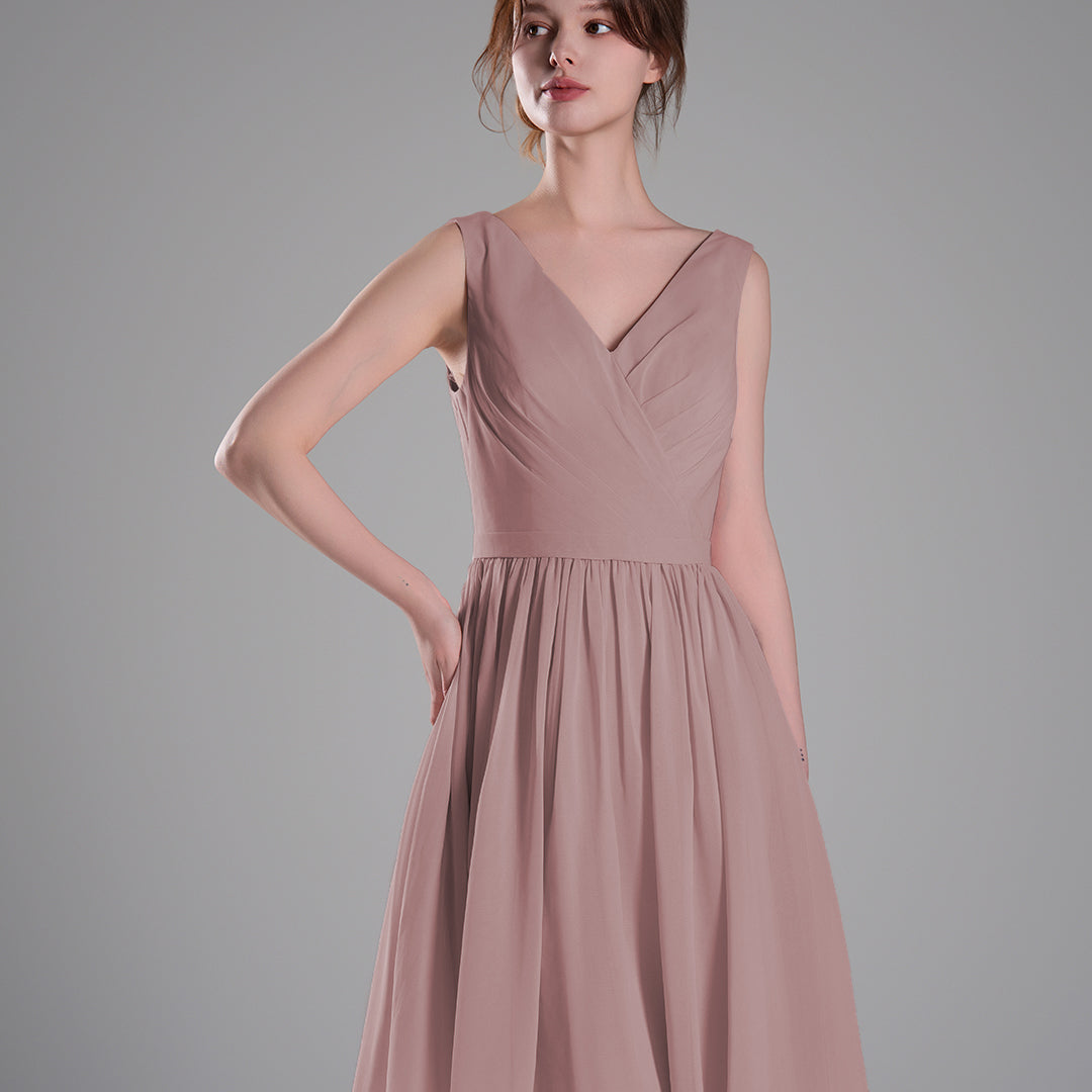 V-Neck Sleeveless Pleated Bodice Flowing Mini Dresses