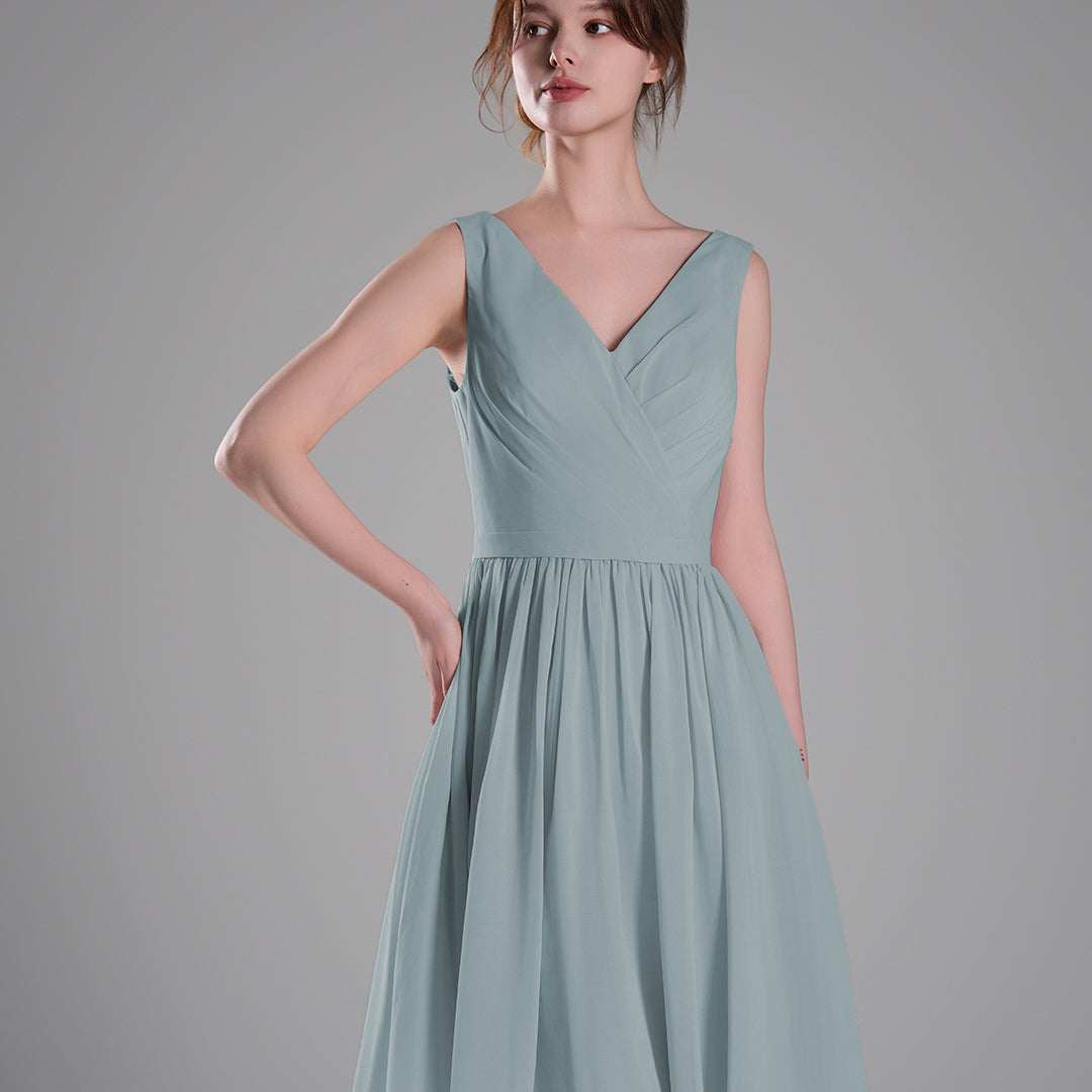 V-Neck Sleeveless Pleated Bodice Flowing Mini Dresses