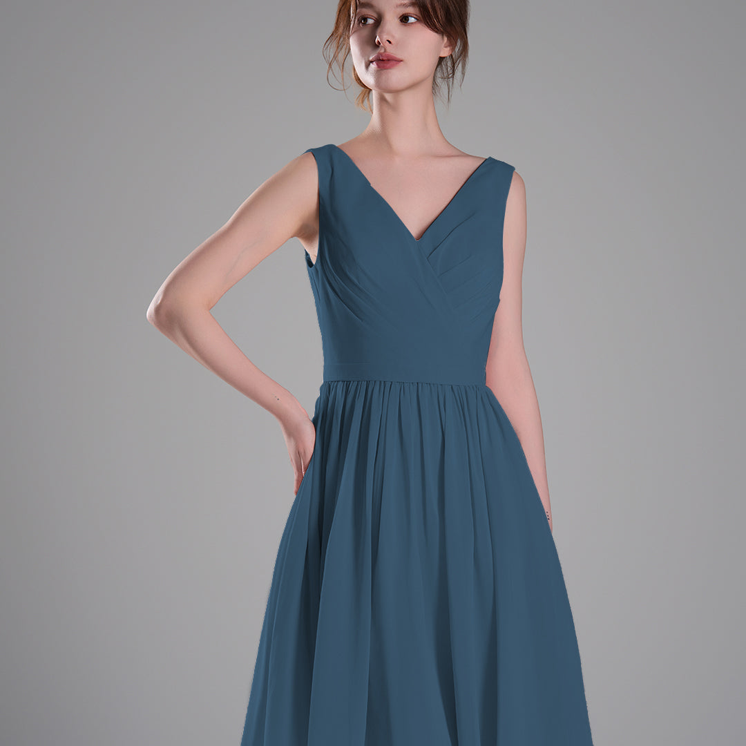 V-Neck Sleeveless Pleated Bodice Flowing Mini Dresses