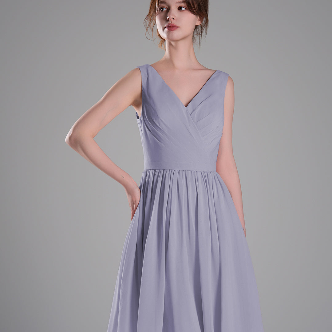 V-Neck Sleeveless Pleated Bodice Flowing Mini Dresses