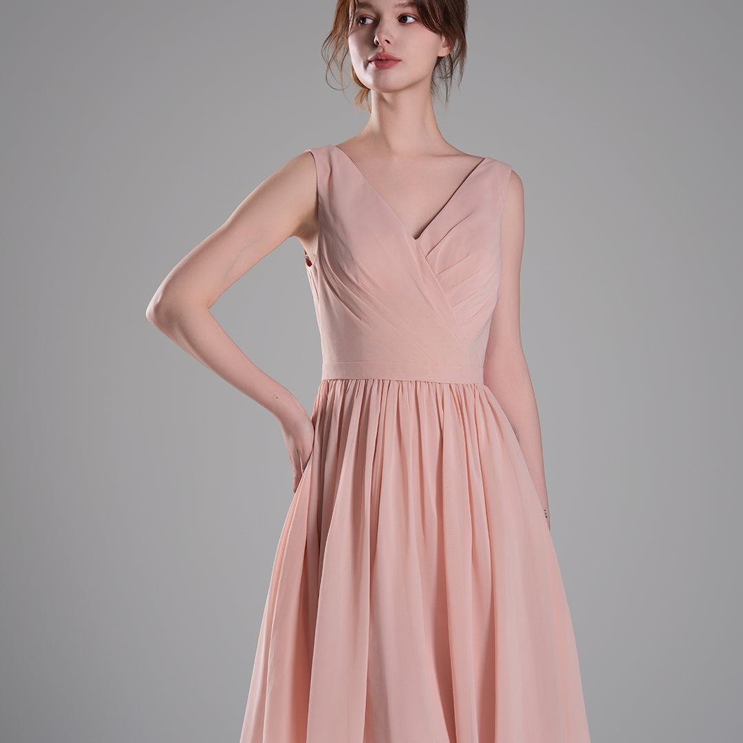 V-Neck Sleeveless Pleated Bodice Flowing Mini Dresses